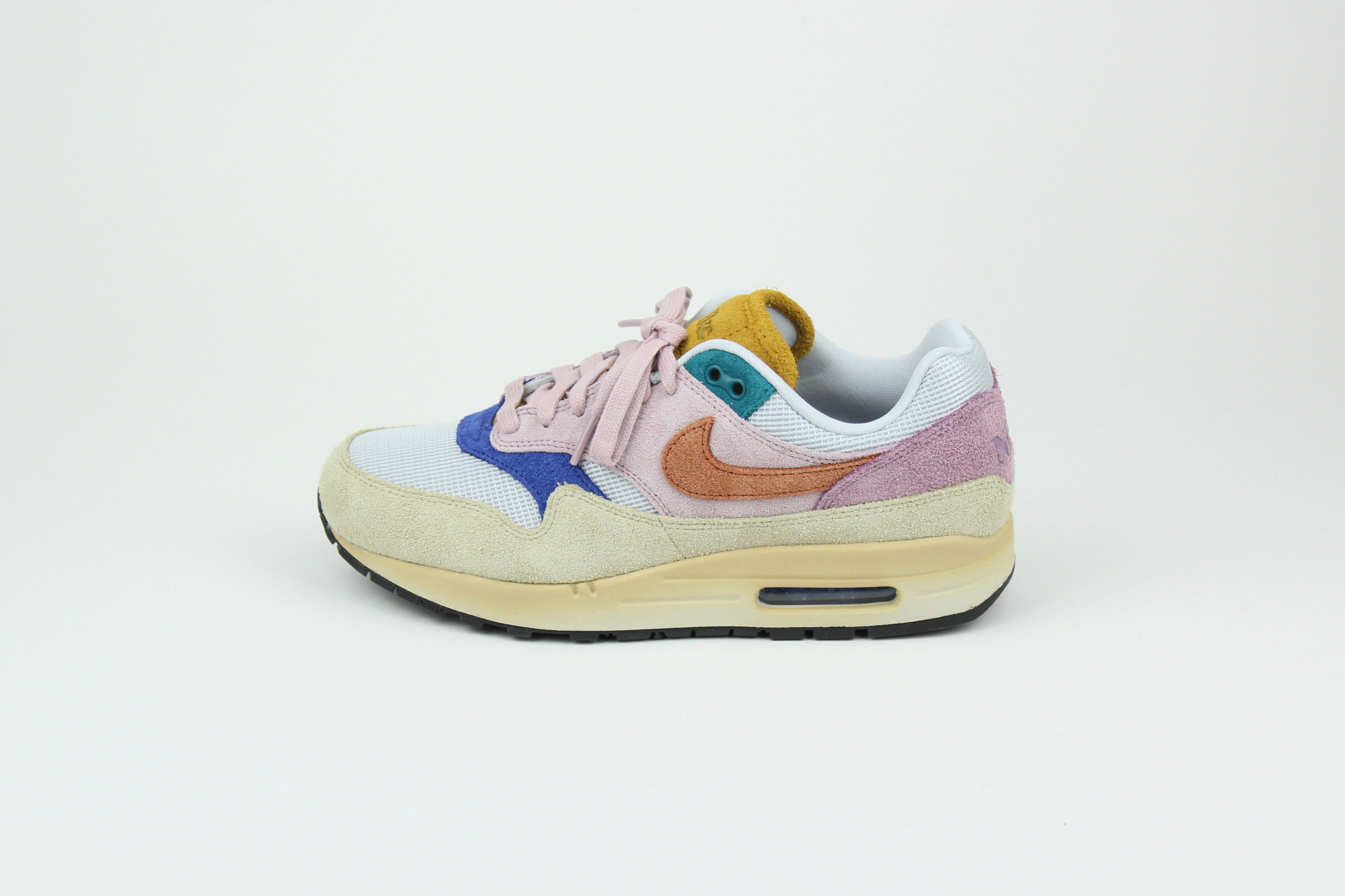 Nike Air Max 1 ’87 Premium “Tan Lines” with patchwork suede panels in Plum Fog and Burnt Sunrise. December 2023 release. Shop now!