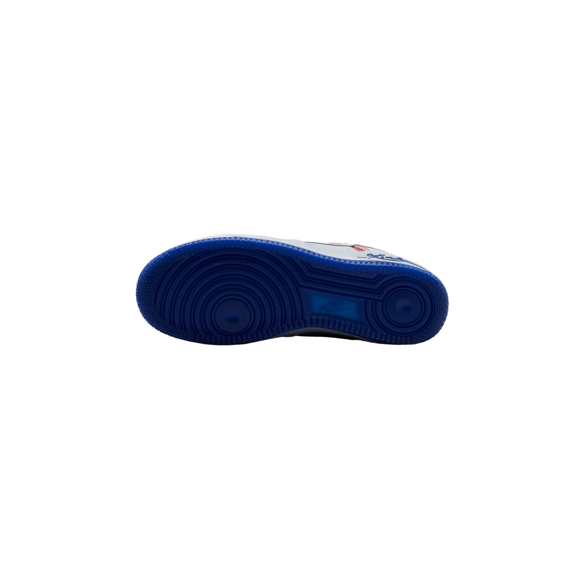 Bottom view of a single sneaker showing a blue rubber outsole with circular tread patterns and a Nike logo near the heel