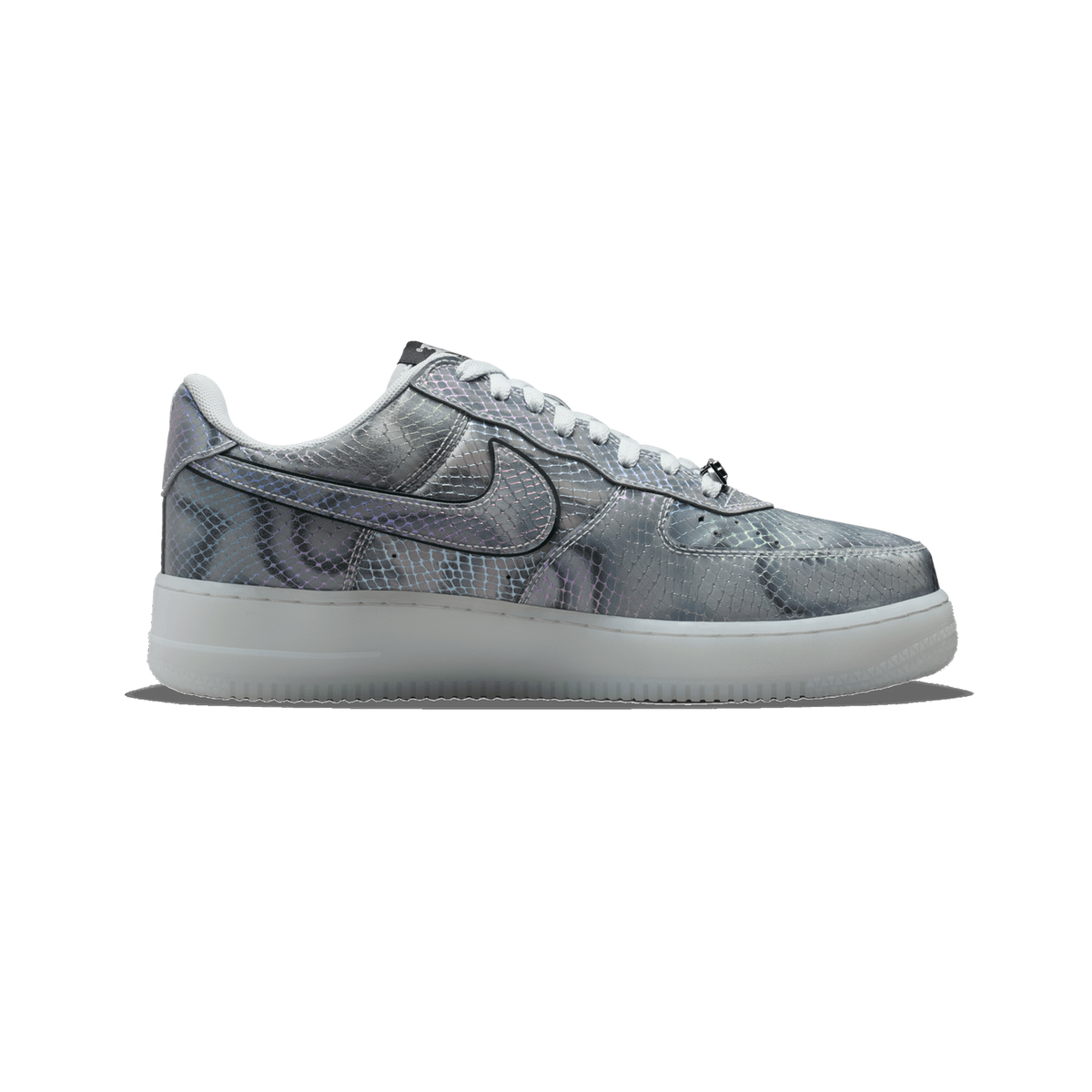 Side view of a single grey, iridescent snakeskin-textured Nike Air Force 1 Low with a black Swoosh outline and a frosted translucent sole, toe pointing left.