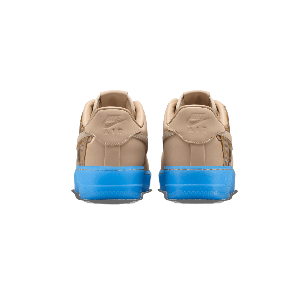 Rear view of a pair of beige linen Nike Air Force 1 Low sneakers with blue translucent soles, showing the Nike Air heel tabs and the backs of both shoes side by side.