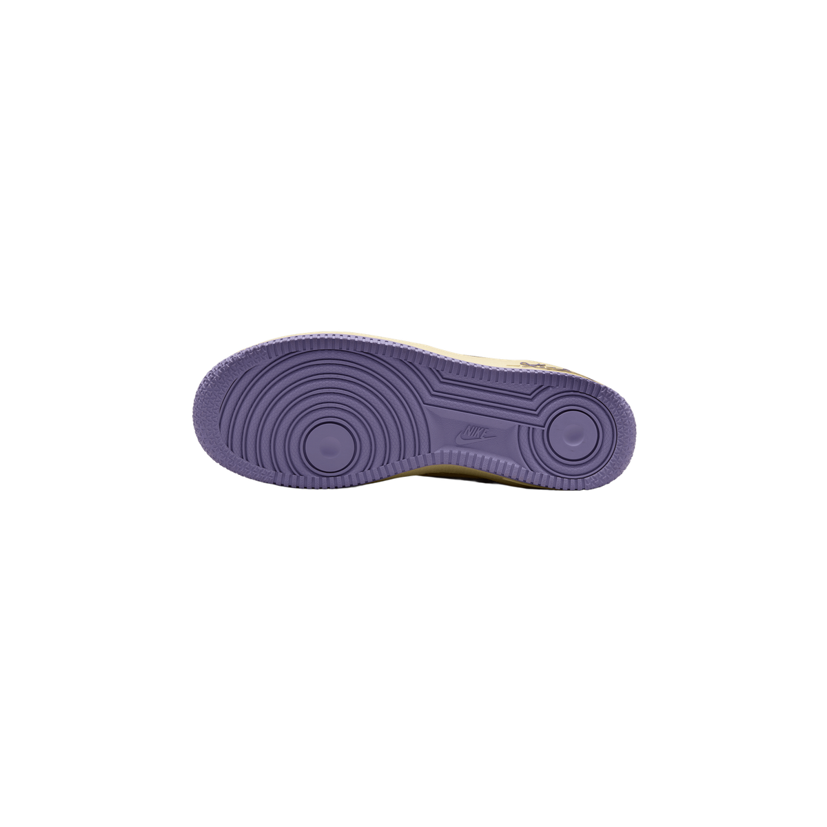 Underside of a single yellow low-top sneaker showing a purple-lilac rubber outsole with circular tread patterns, a Nike swoosh logo near the arch, and a small script logo near the heel-side edge of the midsole.