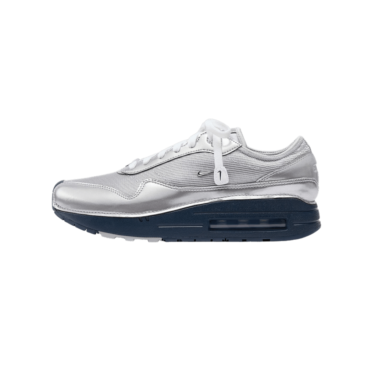 Right side view of a metallic silver Nike Air Max 1 '86 sneaker with white laces, navy visible Air cushioning in the sole, and toe pointing left