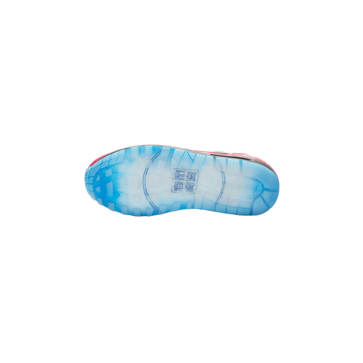 Bottom view of a Nike Air Max 1 sneaker showing a translucent light blue outsole with Chinese character print and a red upper edge visible along the sides