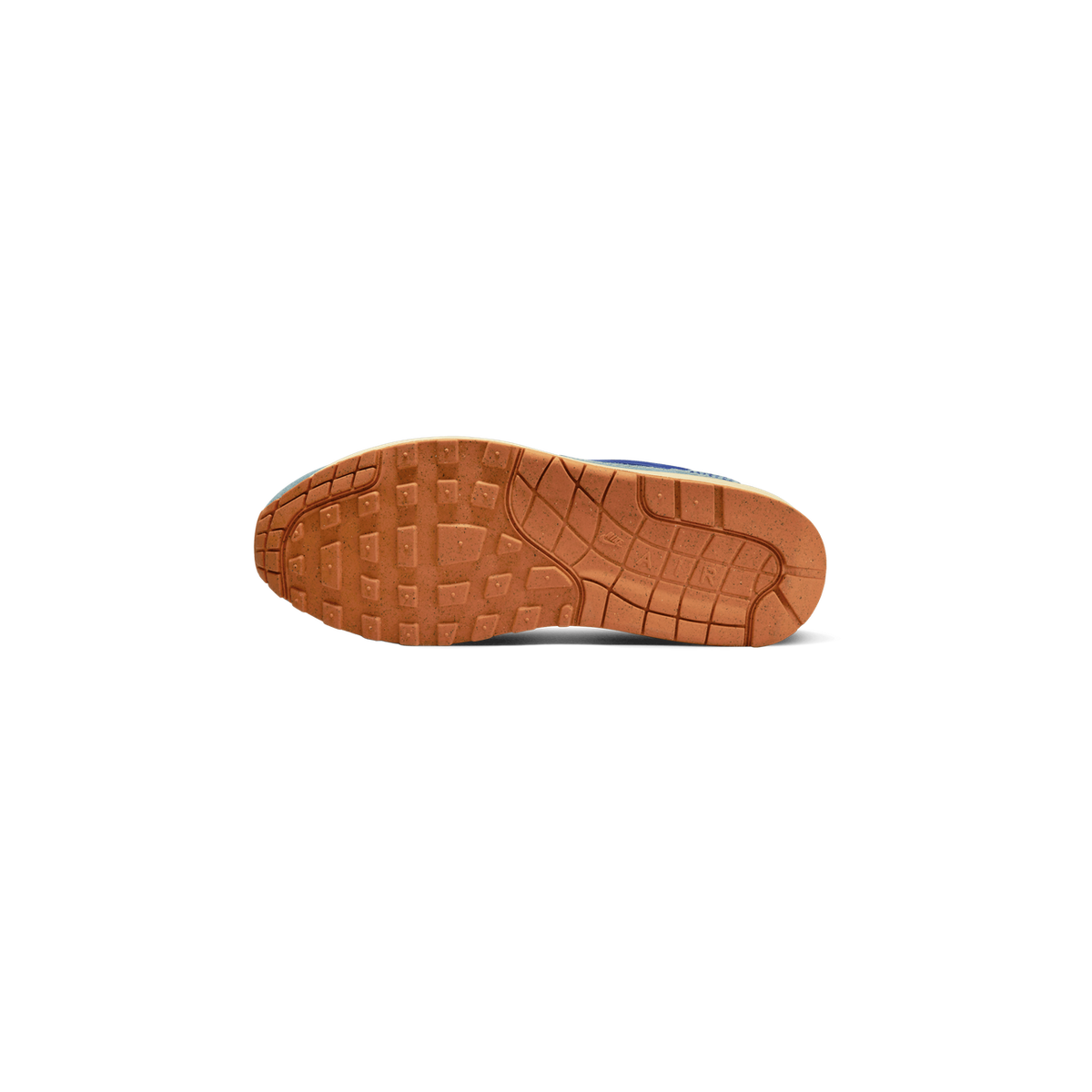 Bottom view of a Nike Air Max 1 sneaker showing the gum rubber waffle-pattern outsole with visible Nike Air branding and blue upper edges peeking through
