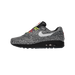 Side view of a Nike Air Max 1 sneaker with a black and white maze print, white swoosh, multicolor laces, and black midsole with visible air unit, toe pointing left