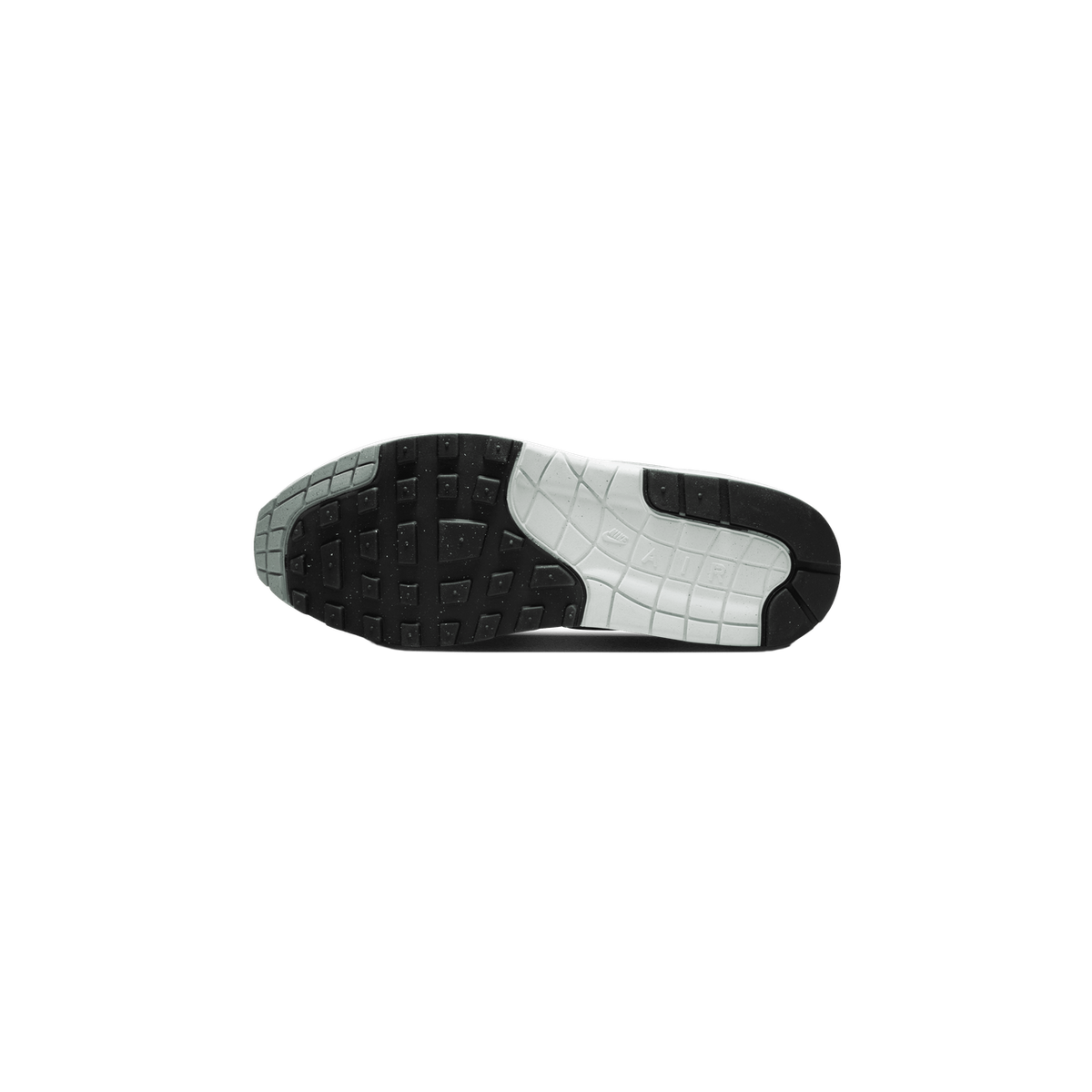 Bottom view of a Nike Air Max 1 sneaker showing the black waffle-tread outsole with a grey Nike Air branded heel section