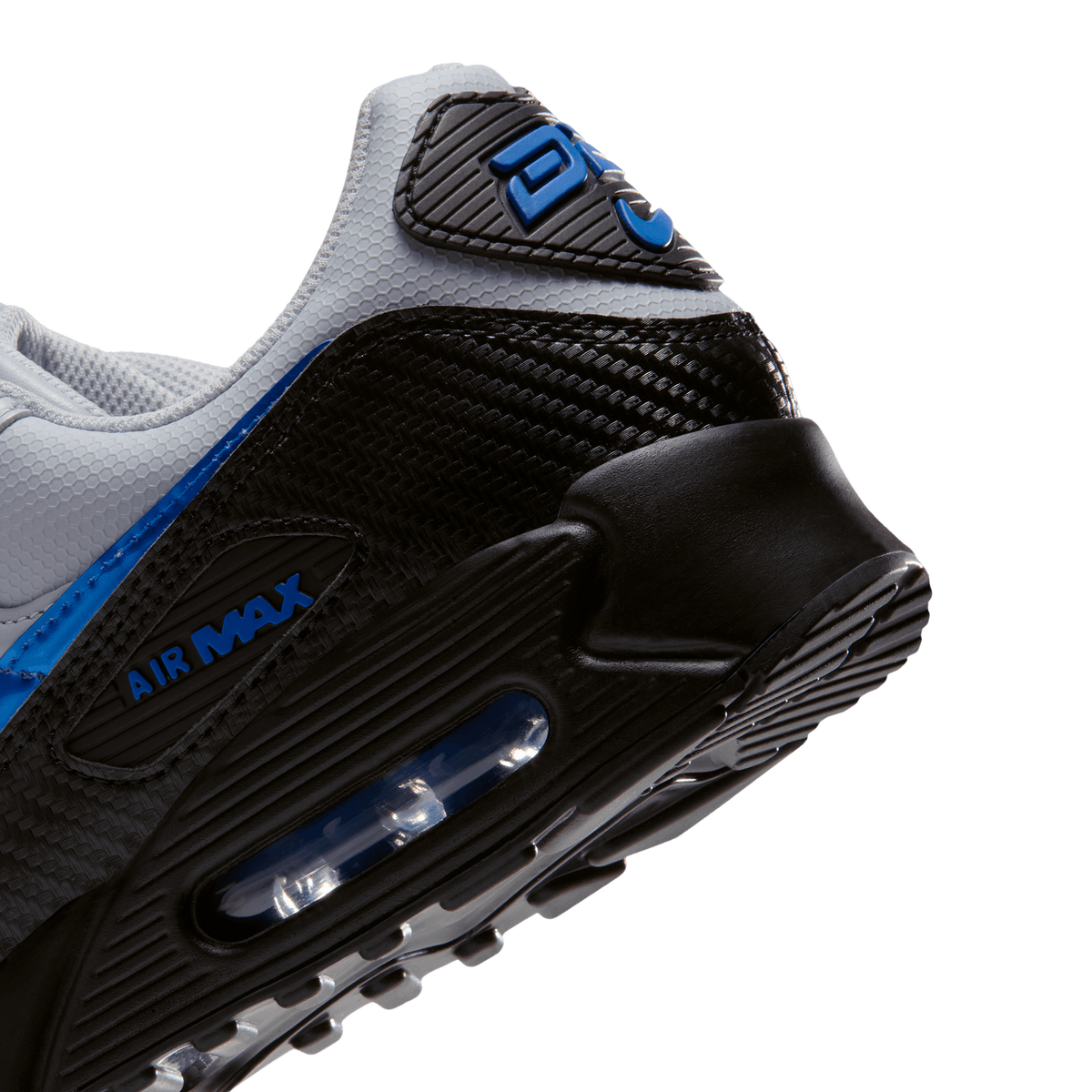 Close-up angled view of a grey, black, and blue Nike Air Max 90 heel and visible air bubble sole unit with 'Air Max' text branding.