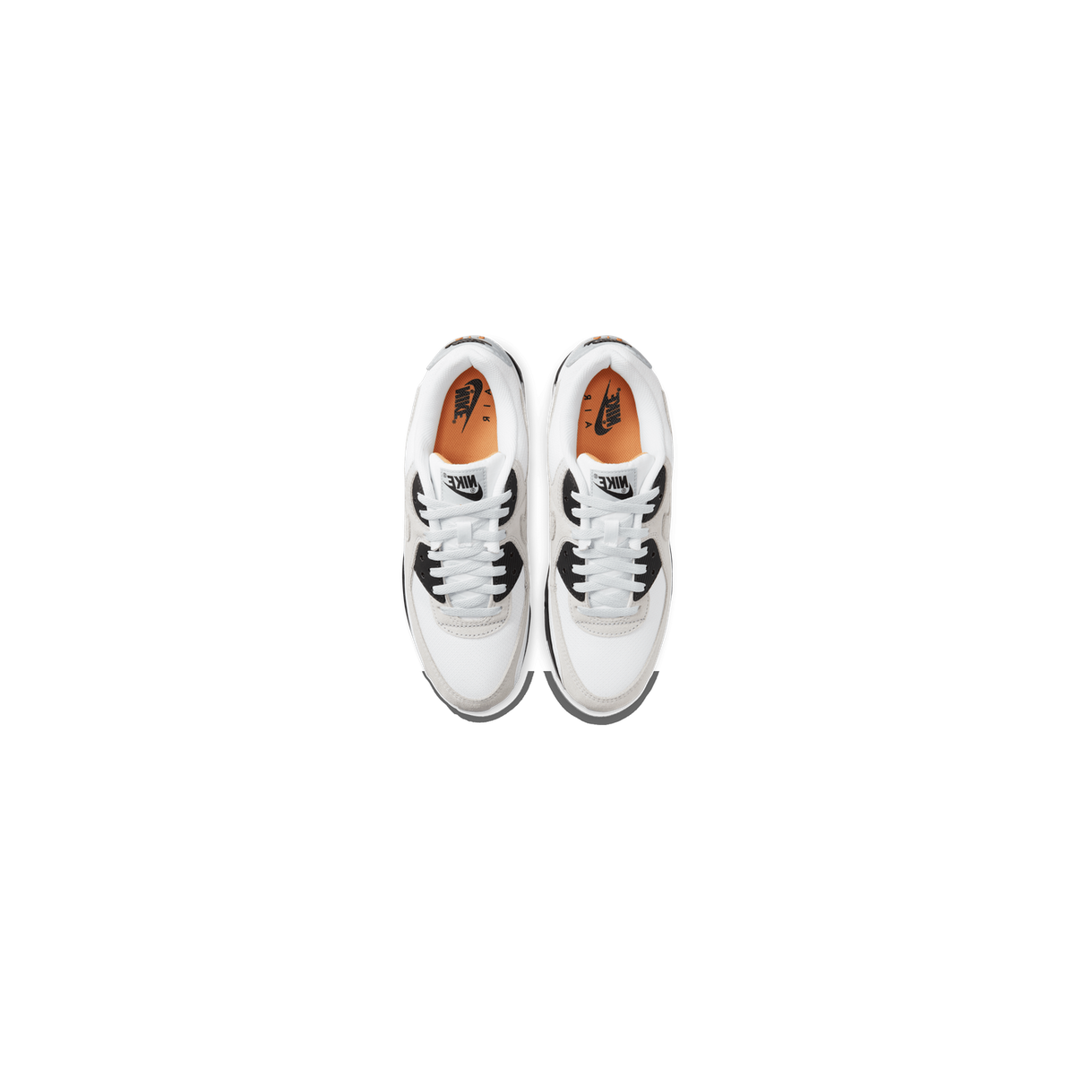 Top-down view of a pair of white Nike Air Max 90 sneakers with black accents on the eyestay, Nike logo tongue tags, and orange insoles visible.