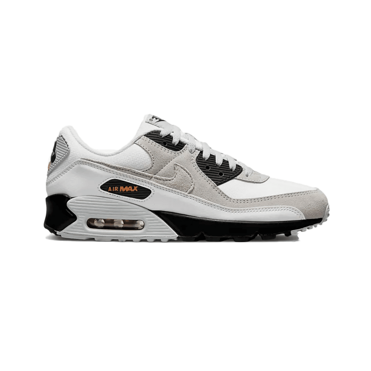 Inside view of a white Nike Air Max 90 sneaker with black accents, grey suede overlays, and orange Air Max branding on the midsole, toe pointing right.