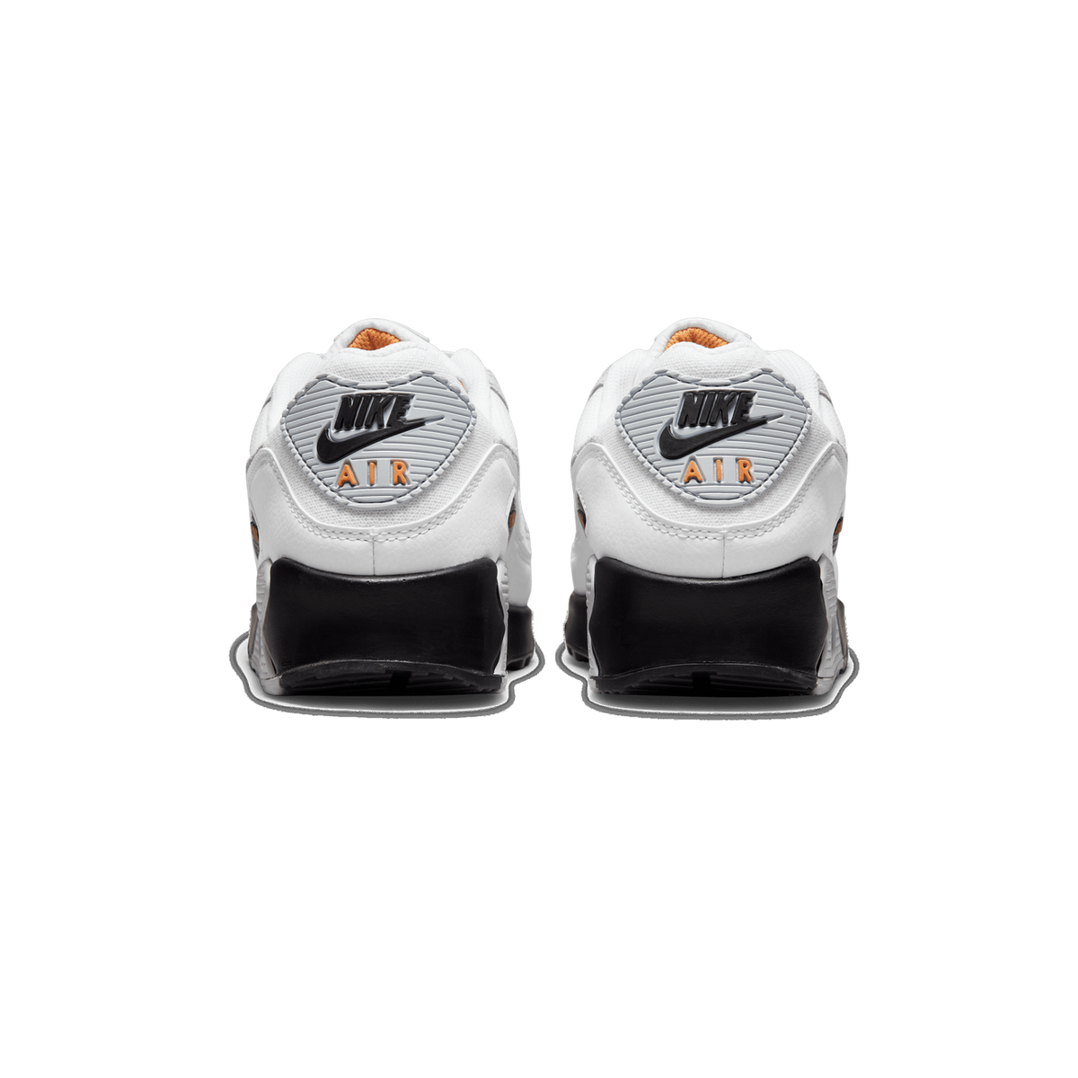 Rear view of a pair of white Nike Air Max 90 sneakers with black heel counters, grey Nike Air logo panels, and orange text accents and lining.