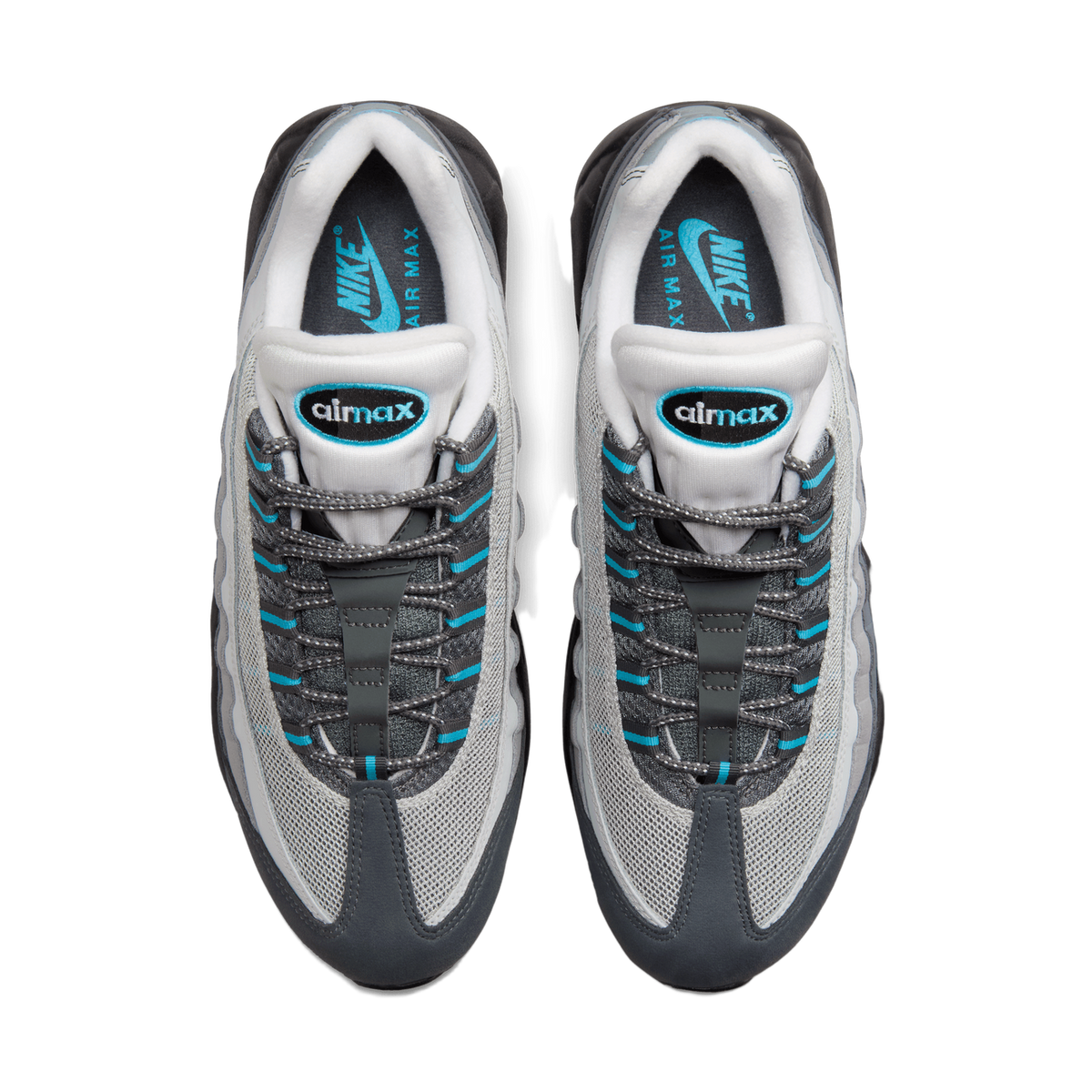 Top-down view of a pair of Nike Air Max 95 sneakers in grey and black with blue lace accents and teal Air Max branding on the tongue