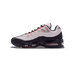 Left Nike Air Max 95 GORE-TEX sneaker shown from the outside with toe pointing left, featuring white upper, black overlays, orange and gray lace loops, and a visible Air unit in the heel