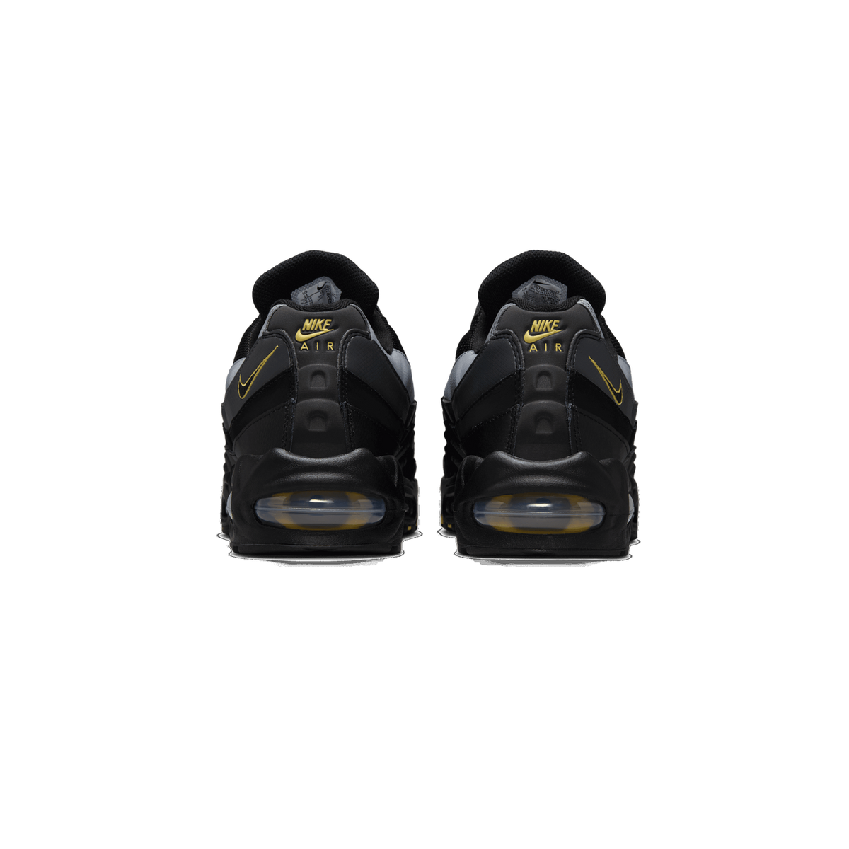Rear view of a pair of black Nike Air Max 95 sneakers on a white background, showing the heel counters with yellow Nike Swoosh and AIR logos and the yellow-tinted Air units at the heels.