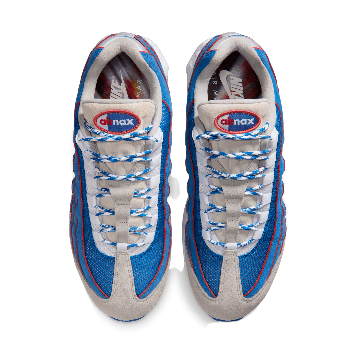 Top-down view of a pair of blue, grey, and red Nike Air Max 95 sneakers with Air Max tongue patches and white checkered laces