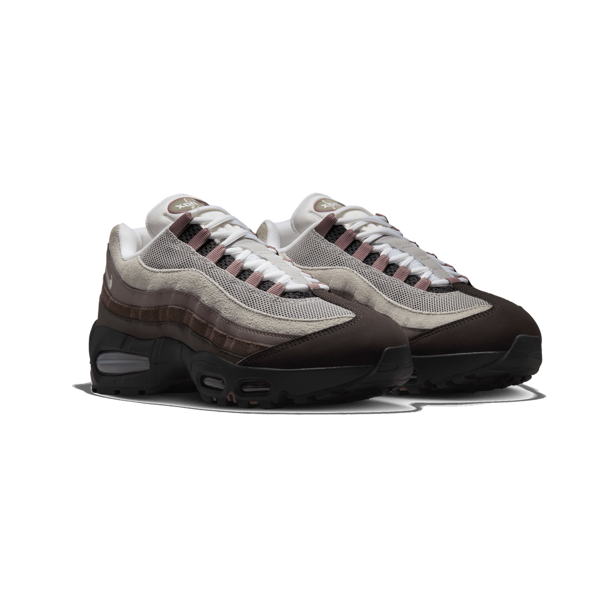 Front angled view of a pair of Nike Air Max 95 sneakers in brown, grey, and mauve tones with black soles and layered side panels.