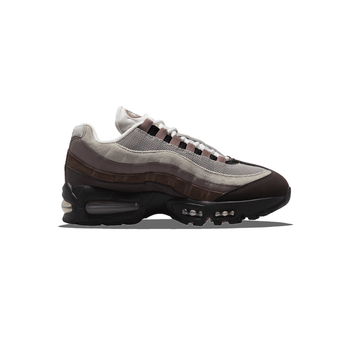 Side view of a brown and grey Nike Air Max 95 sneaker with layered suede and mesh panels, a visible air bubble unit in the black midsole, and mauve lace loops.