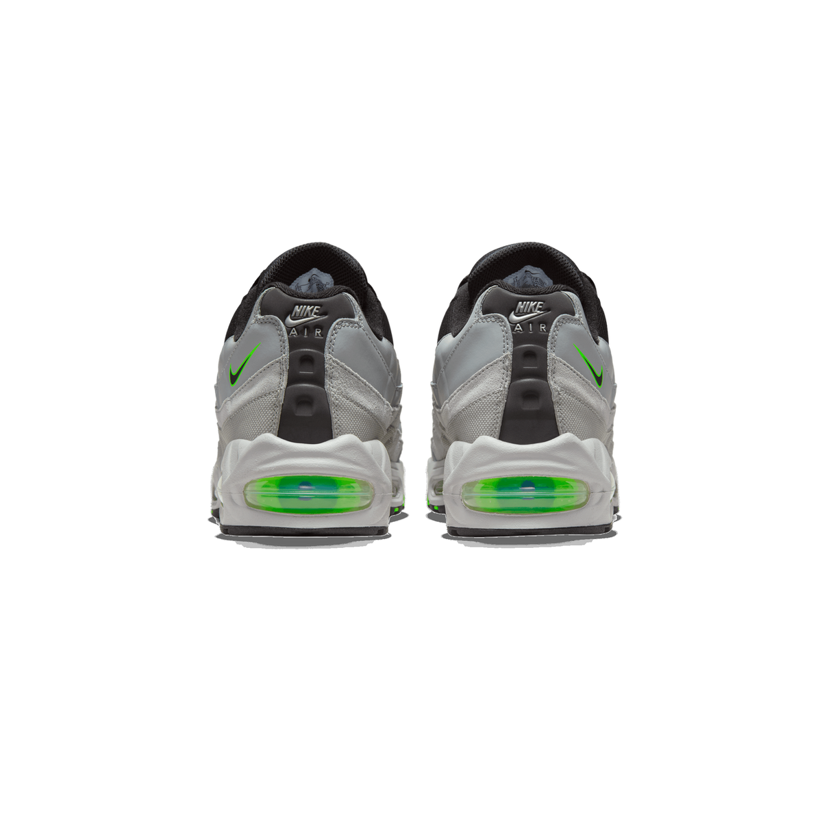 Rear view of a pair of grey Nike Air Max 95 sneakers shown side by side, with bright green Air units visible at the heels and green Swoosh logos on the sides.