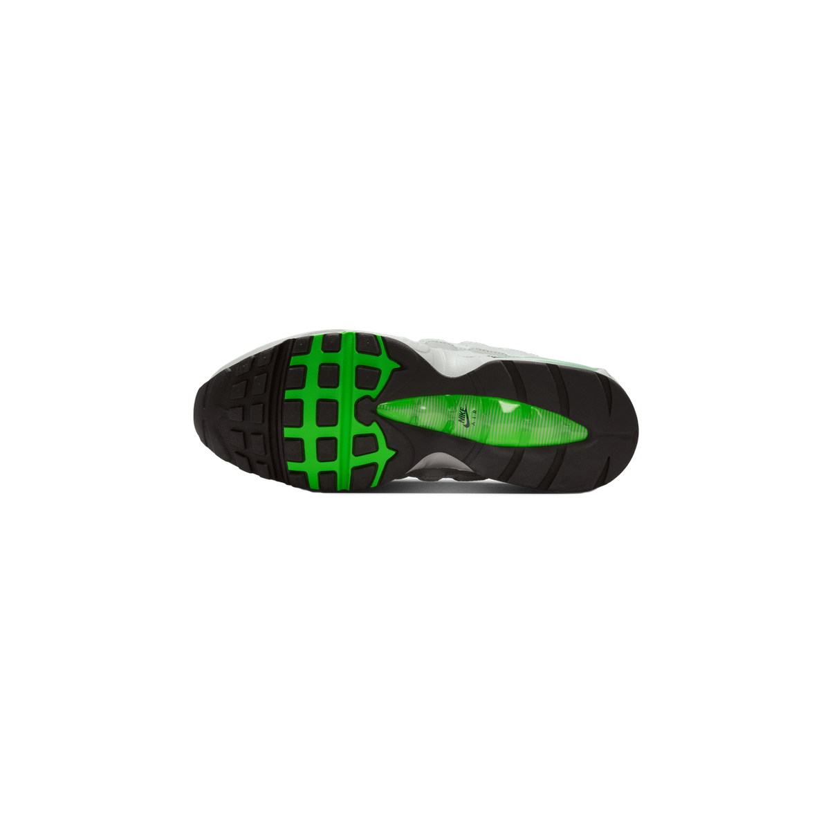 Underside of a grey and white Nike Air Max 95 sneaker showing a black and bright green lugged outsole with a green Nike Air window in the midfoot.