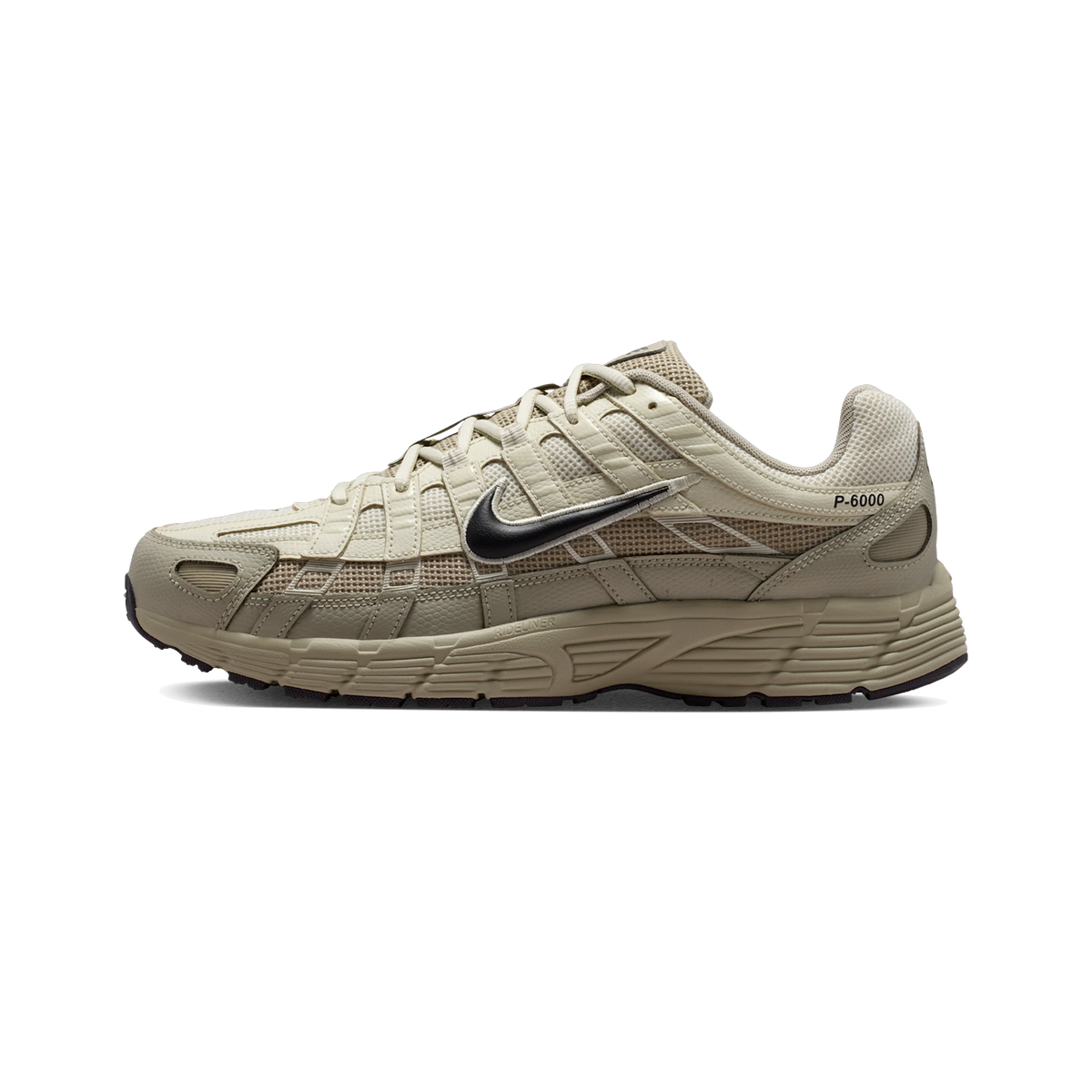 Right lateral view of a beige and tan Nike P-6000 sneaker with black swoosh, chunky ridged midsole, and P-6000 text near the heel
