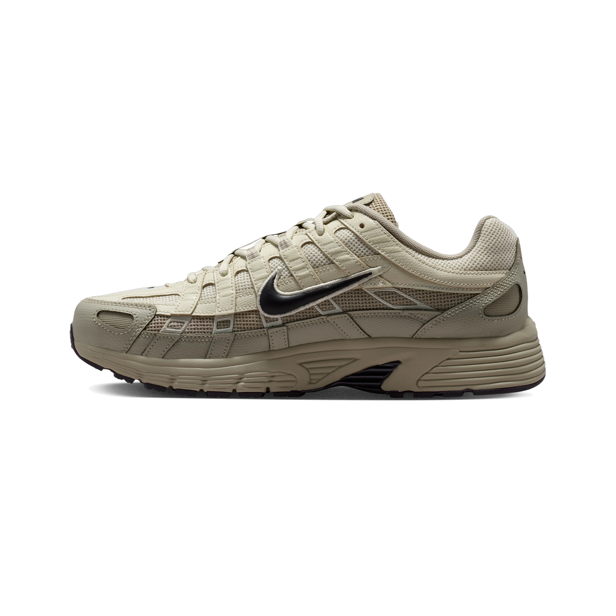 Side view of a beige and khaki Nike P-6000 sneaker with a dark brown swoosh and layered mesh and leather panels.