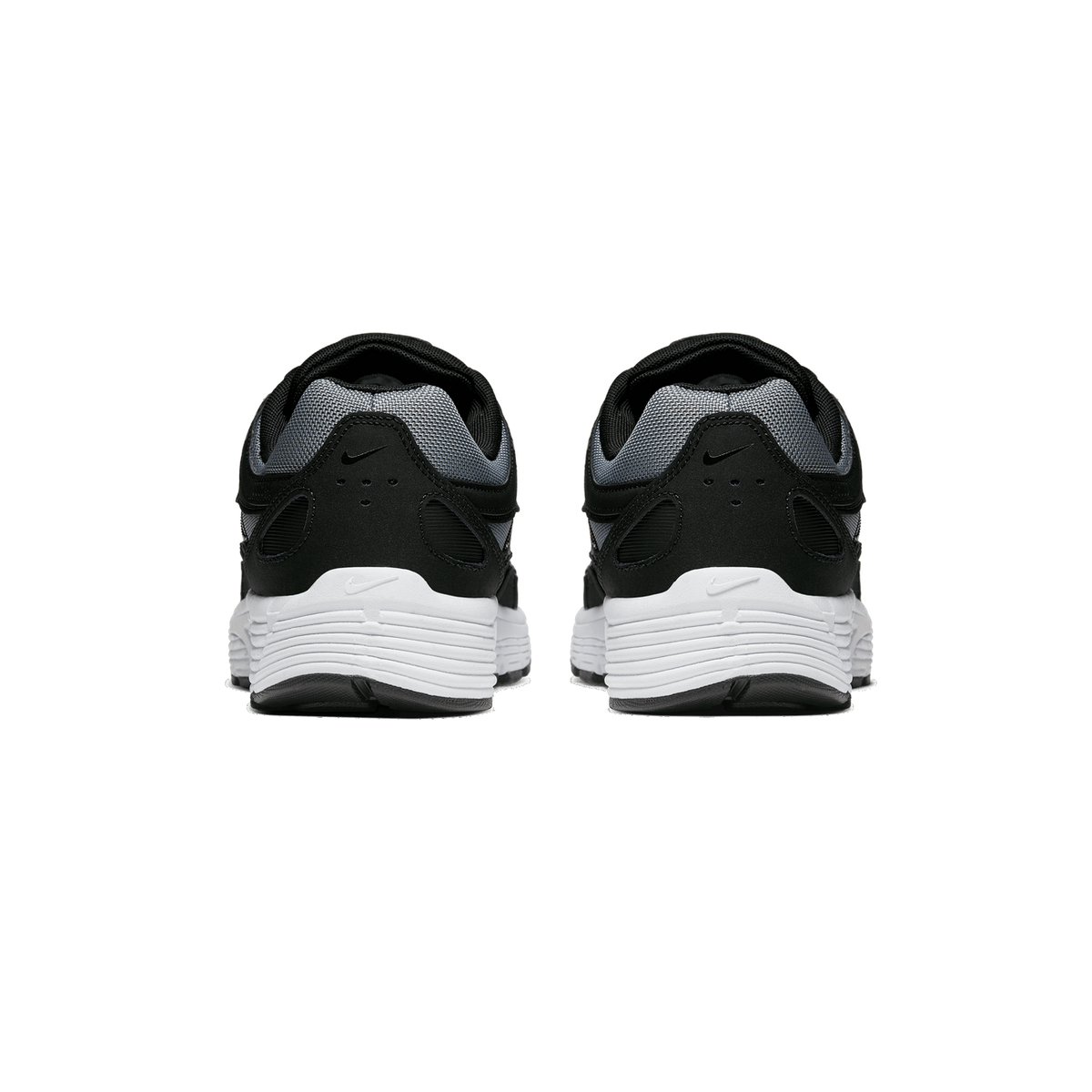Rear view of a pair of black and grey Nike P-6000 sneakers with white midsoles, shown heel-on from behind, with the Swoosh visible on each heel.