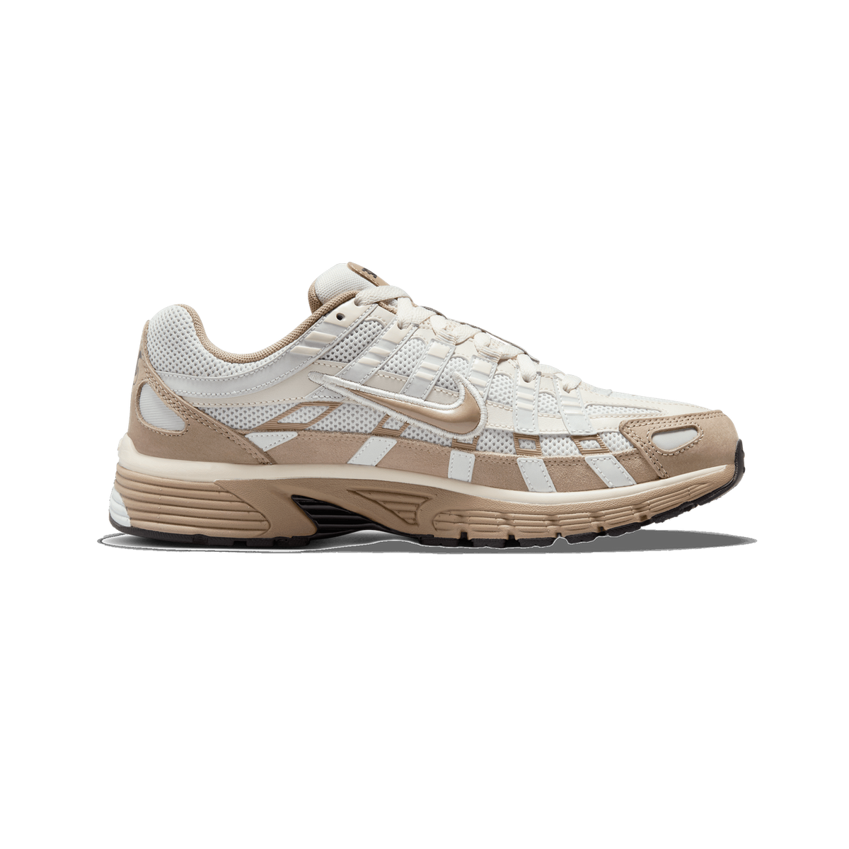 Side profile of a Nike P-6000 sneaker in cream, off-white and tan tones, toe pointing left, showing the embroidered Swoosh logo, mesh panels and tan suede overlays.