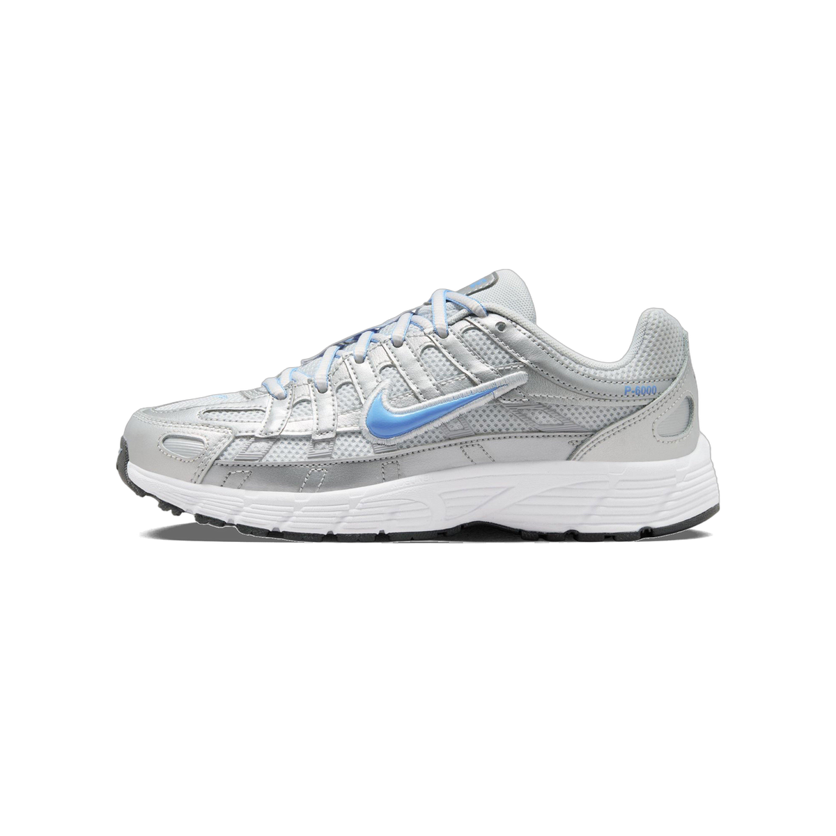 Left Nike P-6000 sneaker in metallic silver with blue Swoosh and laces, shown from the outside with white midsole and black outsole