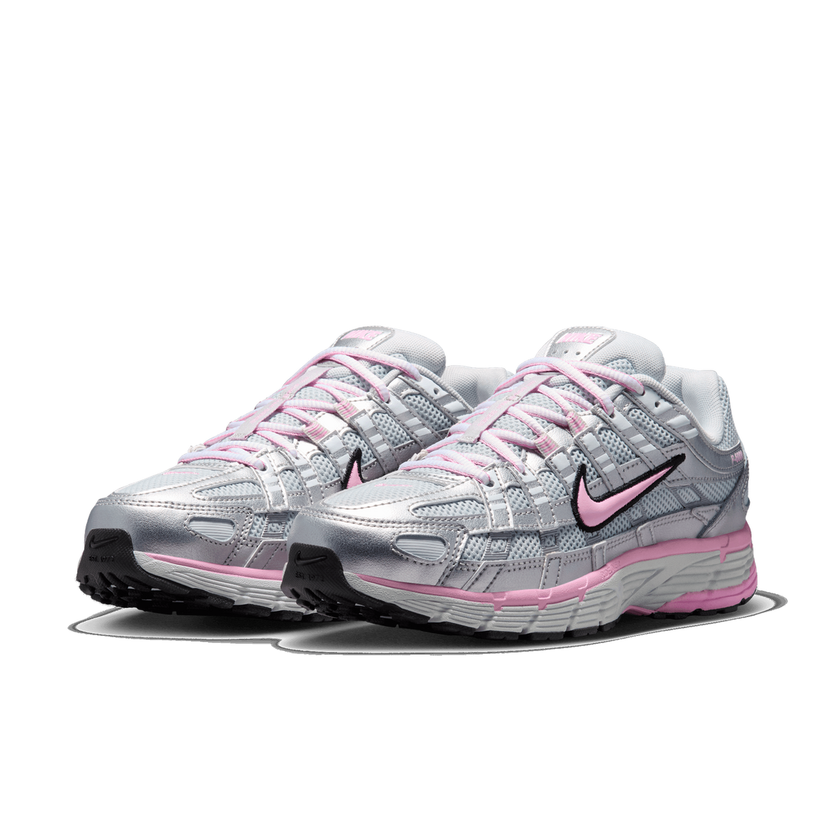 Pair of Nike P-6000 sneakers in metallic silver with pink laces, pink midsole accents, and a pink swoosh outlined in black, angled toward the left