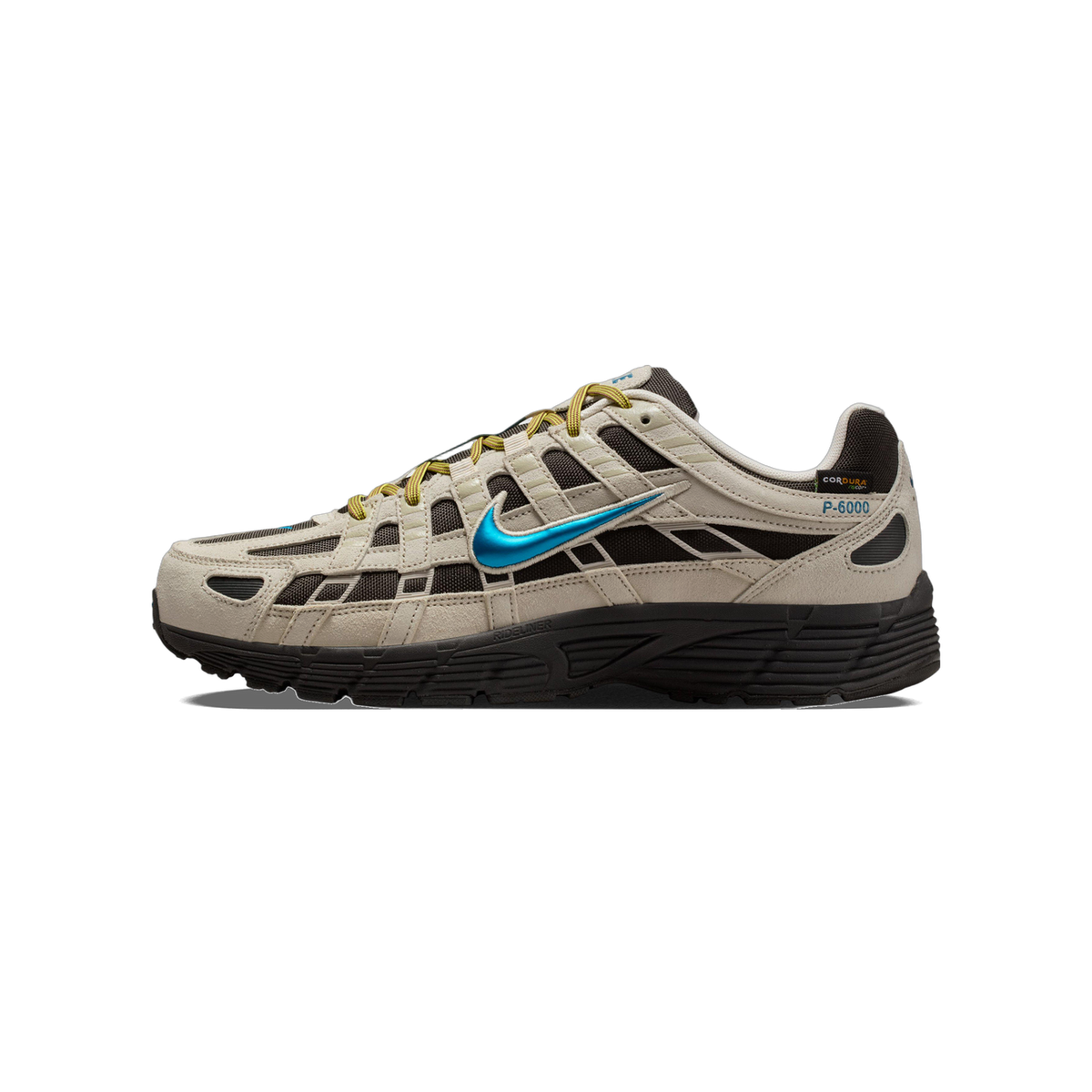 Left Nike P-6000 Cordura sneaker in beige and dark brown with a blue metallic swoosh, yellow laces, and black sole, shown from the outside with toe pointing left.