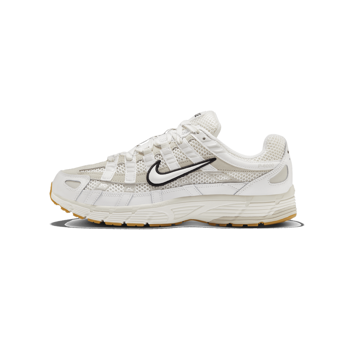 Side profile of a white Nike P-6000 sneaker with a mesh and suede upper, a black-outlined white Swoosh logo on the side, and a gum-tinted rubber outsole, with the toe pointing left.