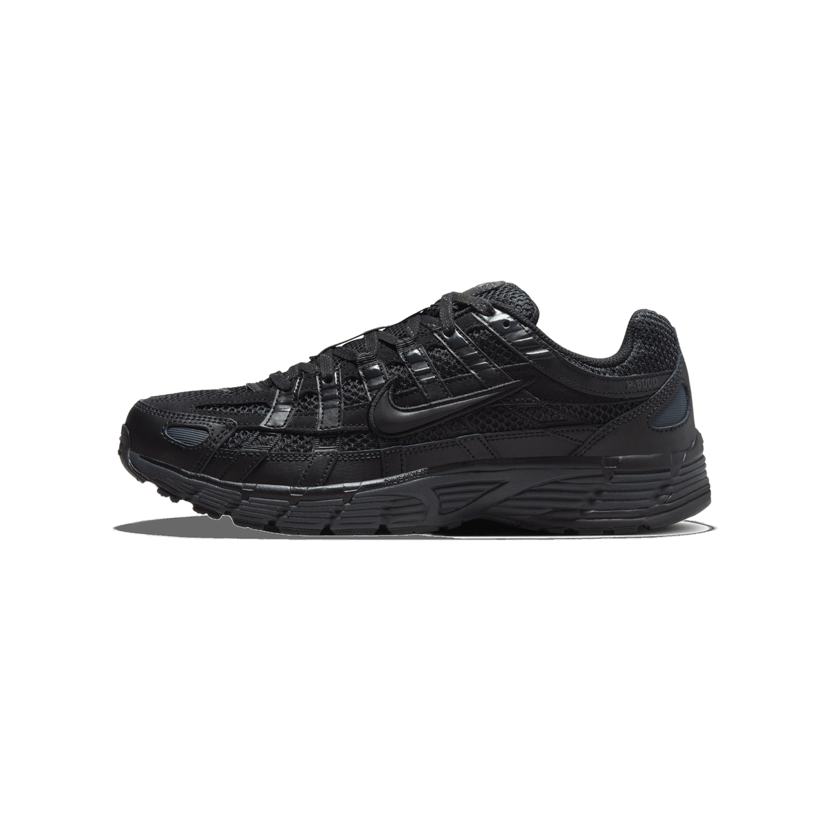 A single black Nike P-6000 sneaker shown from the outside, toe pointing left, with a black mesh upper, glossy overlays, and a Swoosh logo on the side.
