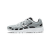 Side profile of a silver and grey Nike P-6000 sneaker with a white midsole and black accents, toe pointing left, showing the embroidered Swoosh logo on the side.
