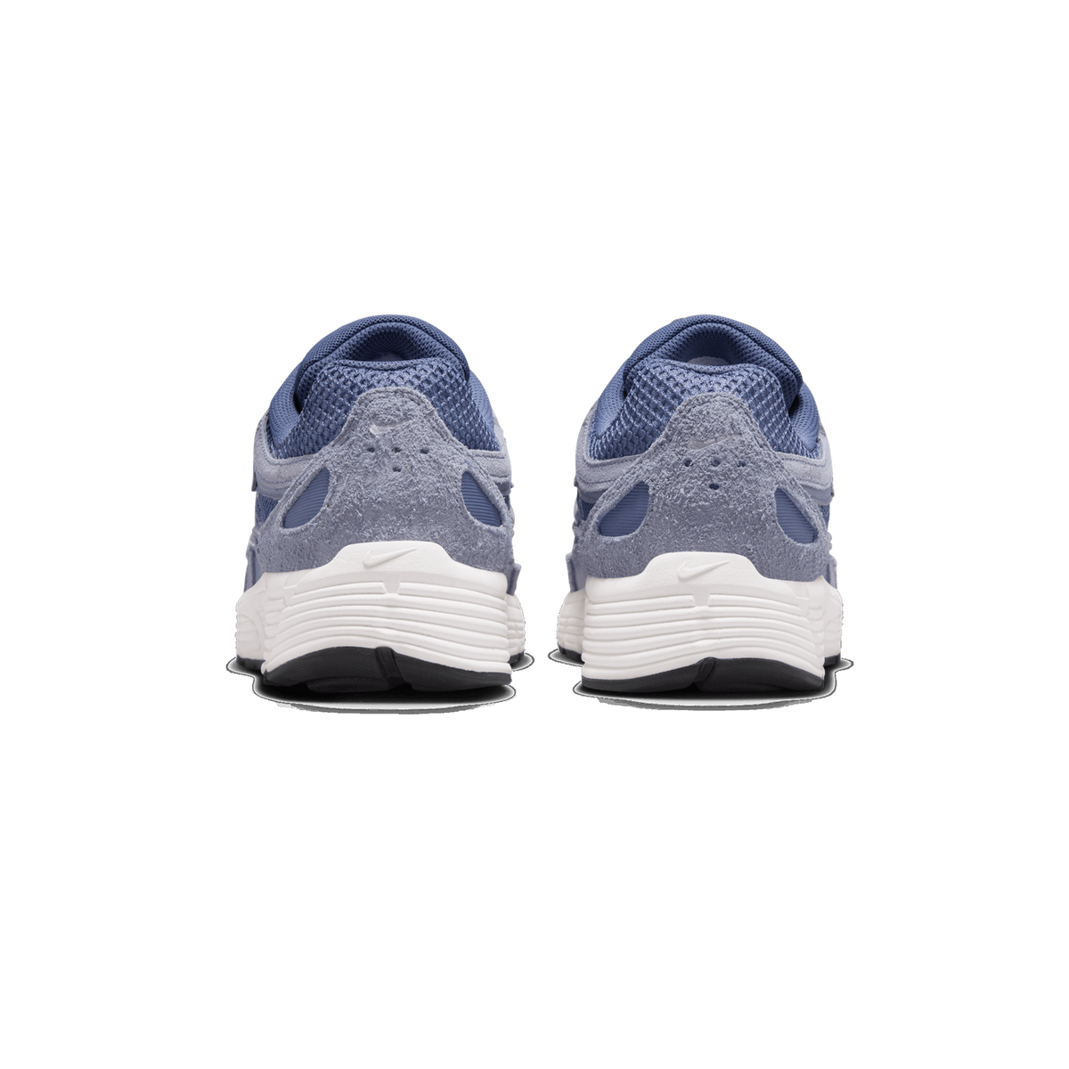 Rear view of a pair of blue and gray Nike P-6000 SE sneakers standing side by side, showing the heel counters with suede overlays, mesh collars, and white midsoles with a Nike swoosh.