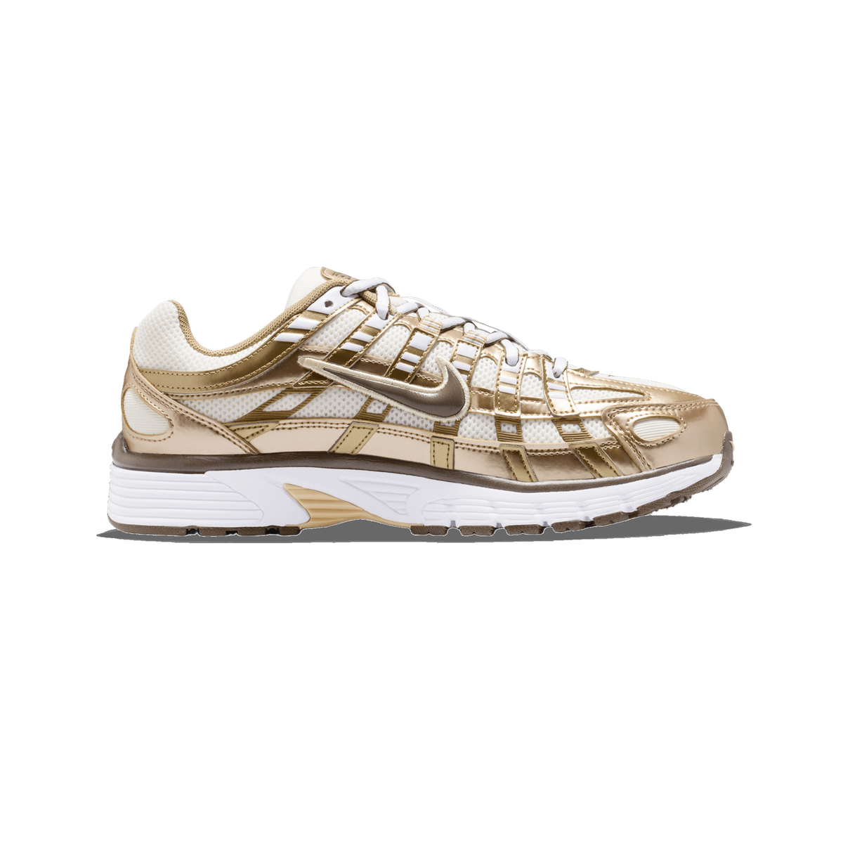 Lateral view of a Nike P-6000 sneaker with metallic gold overlays, off-white mesh upper, and a white midsole with dark brown trim.