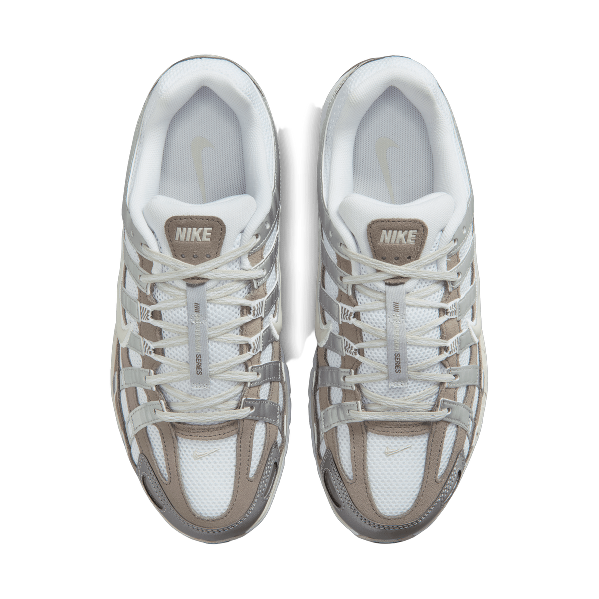 Top-down view of a pair of Nike P-6000 sneakers in white, grey and taupe with caged overlays and white laces