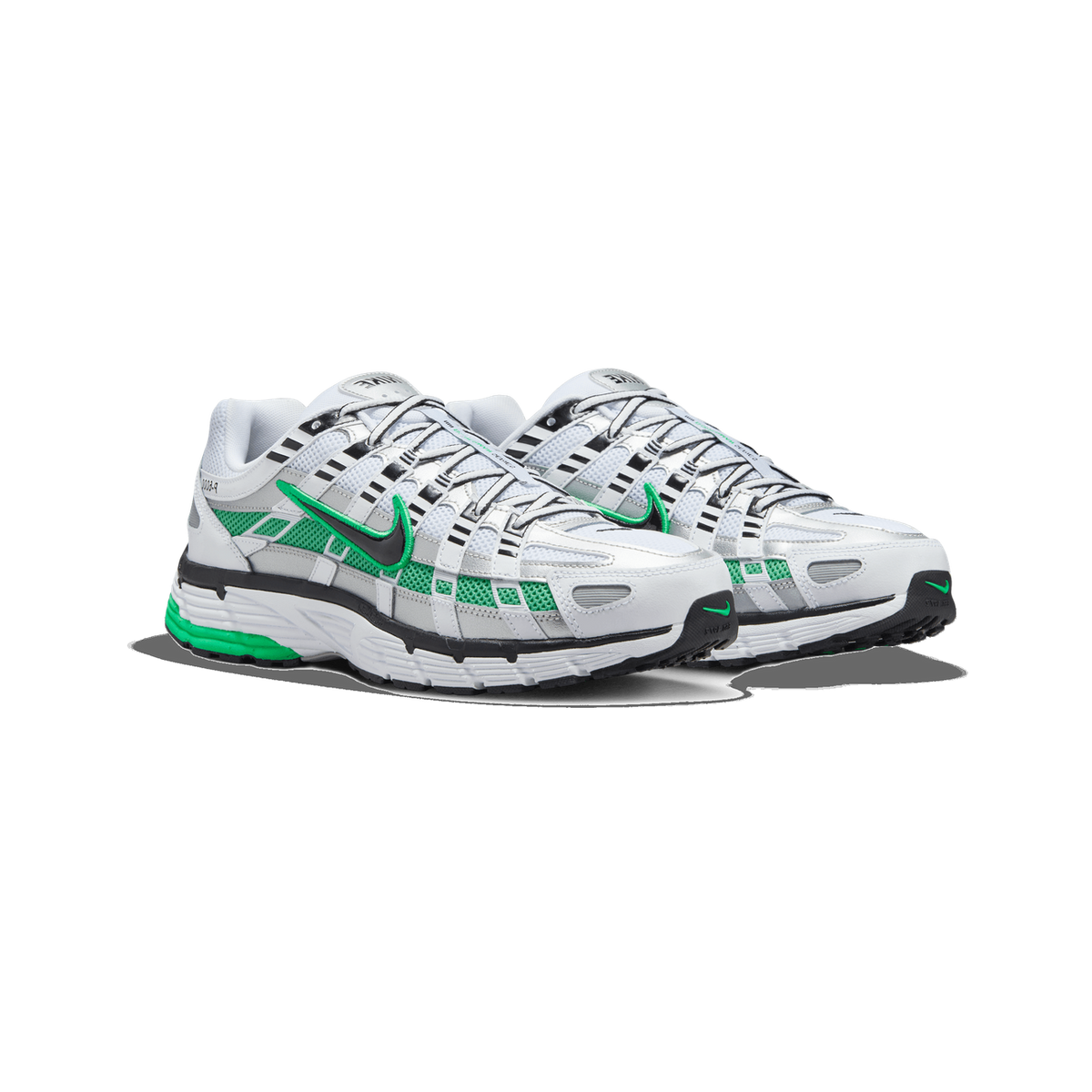 A pair of white and silver Nike P-6000 sneakers with bright green mesh panels and black Swoosh logos, shown side by side angled toward the left at a three-quarter front view.