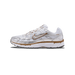 Side profile of a white Nike P-6000 sneaker with metallic silver overlays, a tan-brown outlined Swoosh and P-6000 text, and a tan-brown midsole stripe, with the toe pointing left.