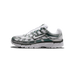 Side profile of a white and metallic silver Nike P-6000 sneaker with green accents, toe pointing left, showing the Swoosh logo and P-6000 branding on the heel.