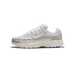 A single white and light grey Nike P-6000 sneaker shown from the lateral side, toe pointing left, with a white Swoosh logo on the mesh upper and a 'P-6000' label on the heel.