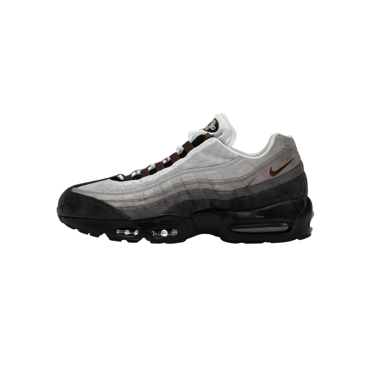 Side view of a Nike SB Air Max 95 sneaker in black, gray, and white with a brown swoosh and visible air unit in the heel.