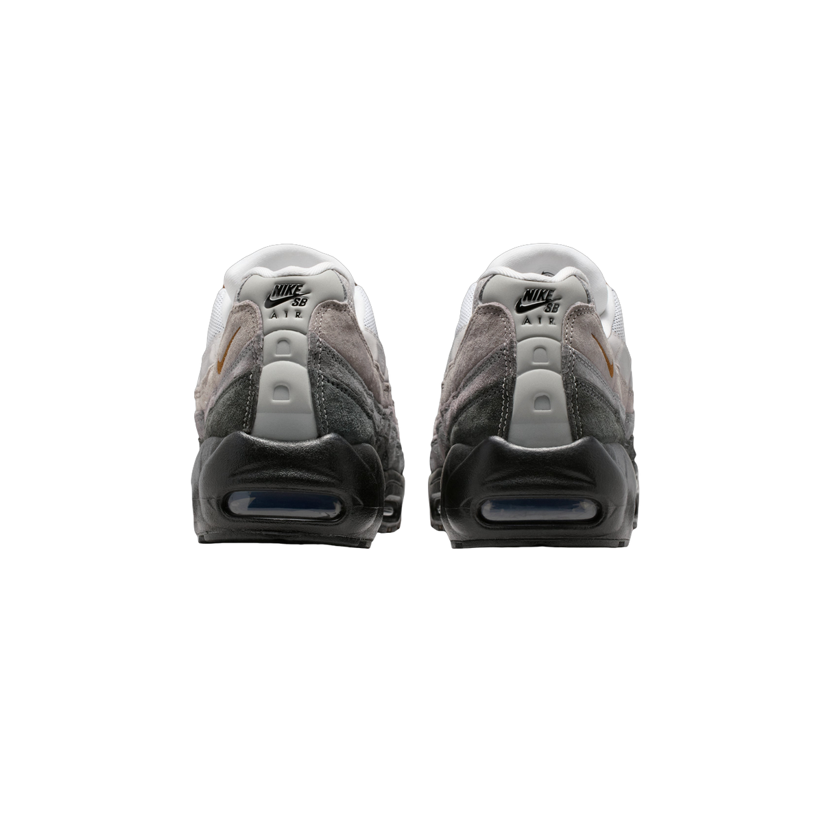 Rear view of a pair of Nike SB Air Max 95 sneakers in gray suede with black heel counters featuring visible Air units and Nike SB Air branding