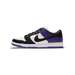 Left Nike SB Dunk Low shoe shown from the side with toe pointing left, featuring a black toe box and heel, white mid-panel, black Swoosh, and purple heel and outsole trim.