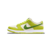 Left Nike SB Dunk Low Green Apple shoe shown from the side with toe pointing left, featuring green suede overlays, cream leather panels, a dark green Swoosh, and a green outsole