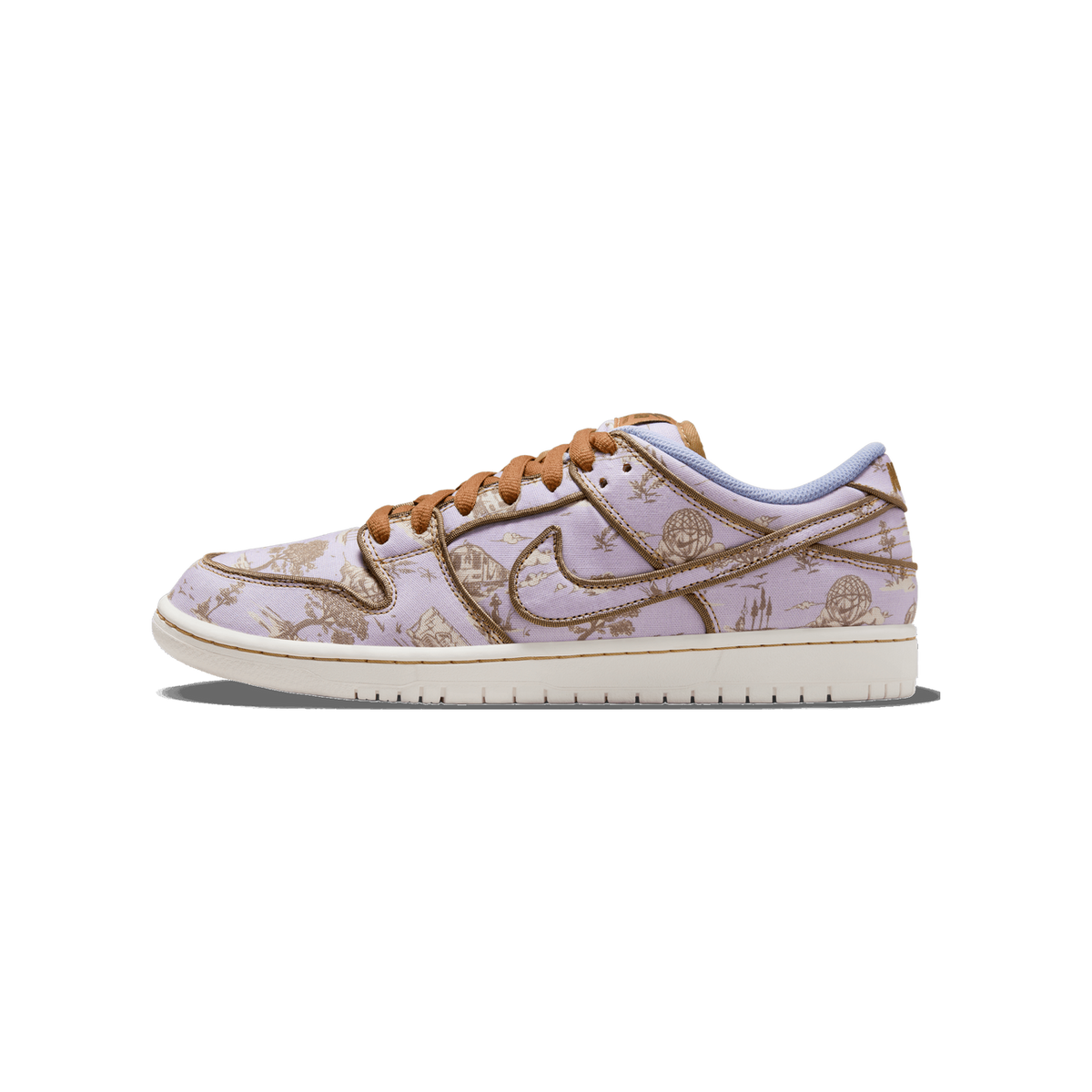 Side profile of a single lavender Nike SB Dunk Low sneaker with a toile-style print in tan and brown, brown laces and stitching, a cream midsole and outsole, and the Swoosh logo on the side, toe pointing left.