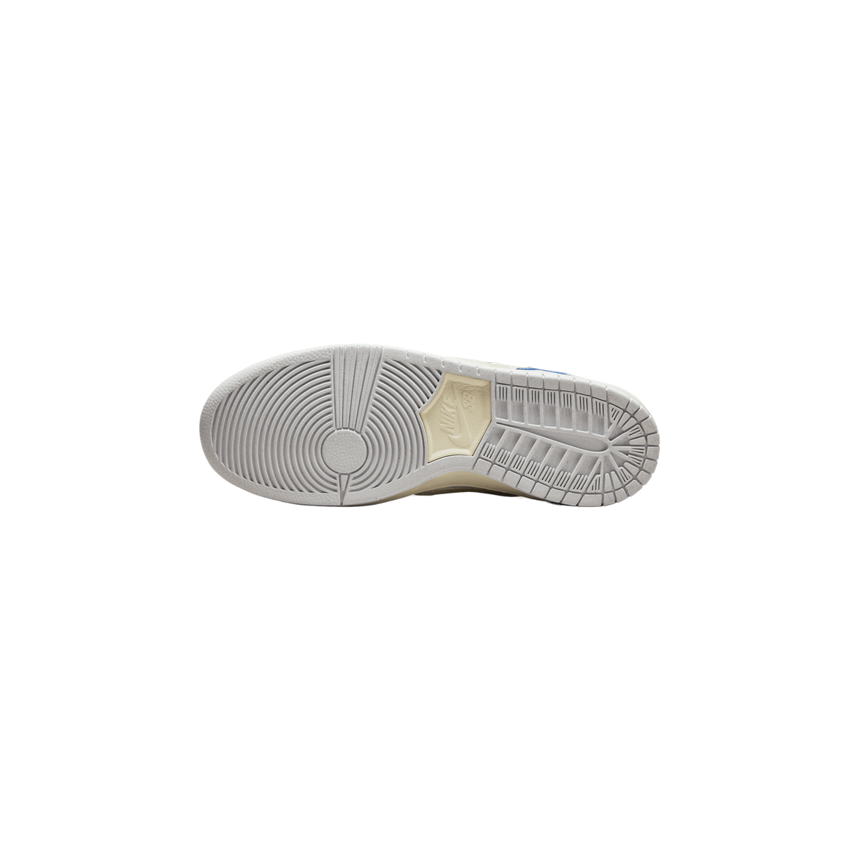 Bottom view of a Nike SB Dunk Low showing the white textured outsole with Nike SB logo on the heel