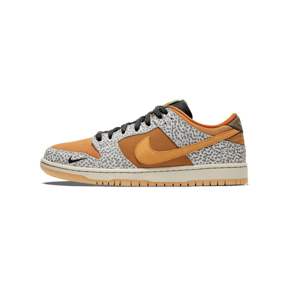 Side profile of a Nike SB Dunk Low sneaker with a toe pointing left, showing a grey safari-print upper, orange canvas toe and tongue area, brown suede panel with an orange Swoosh, black laces, and a cream and tan rubber midsole.