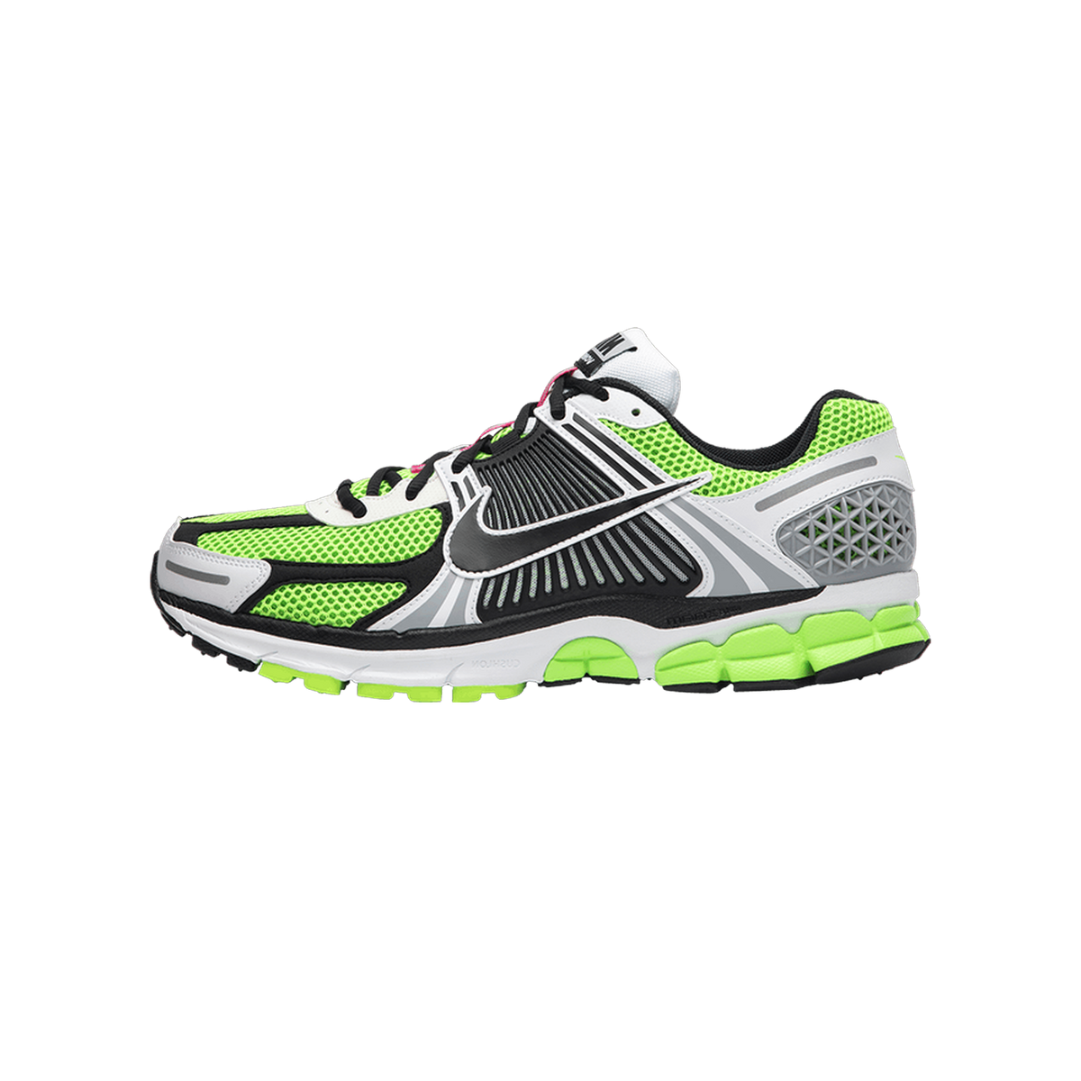 Side view of a Nike Zoom Vomero 5 running shoe in electric green, black, and white with mesh upper and layered midsole, toe pointing left