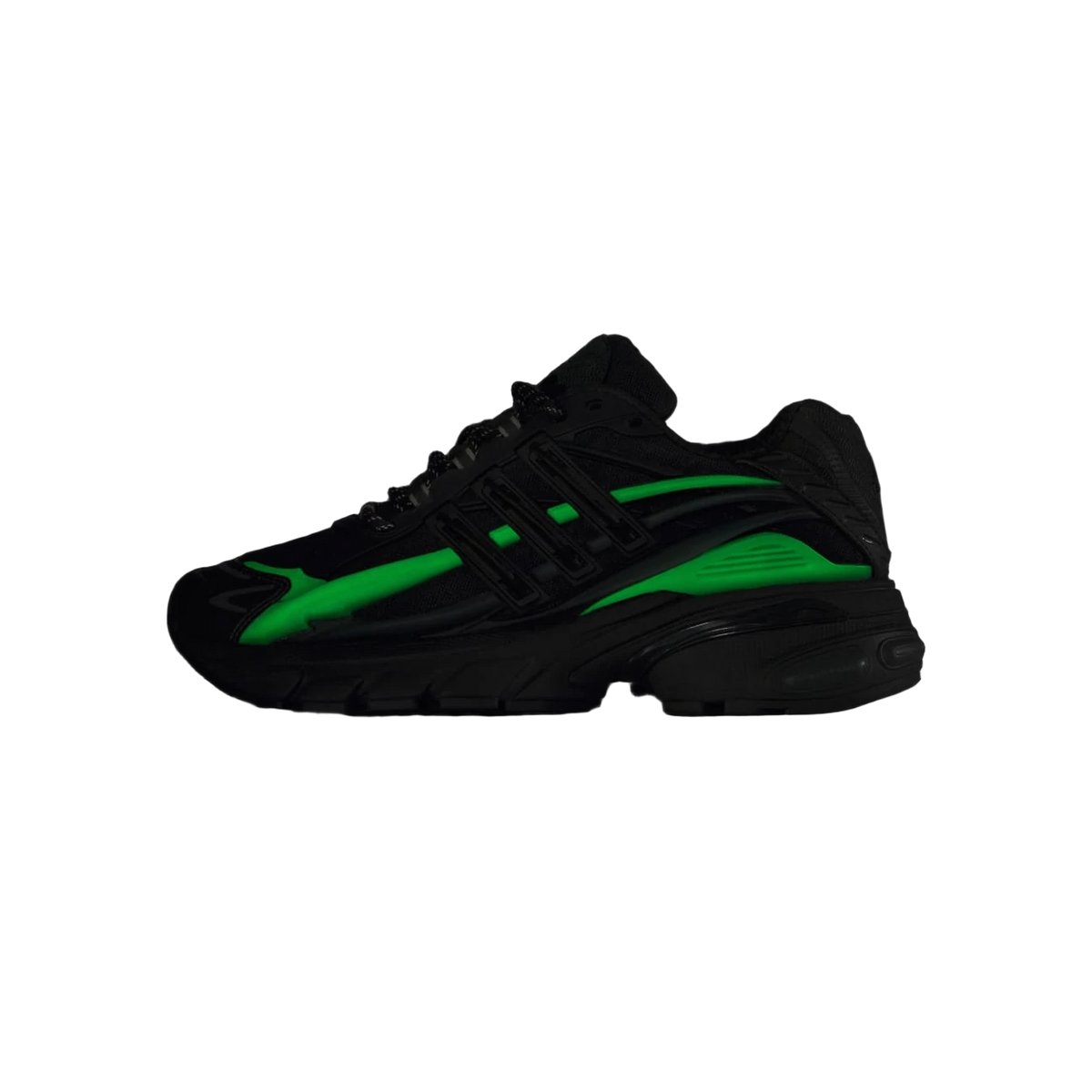 Side view of a black chunky sneaker with green underlay accents along the midfoot and heel, black three-stripe branding, and a black textured sole.
