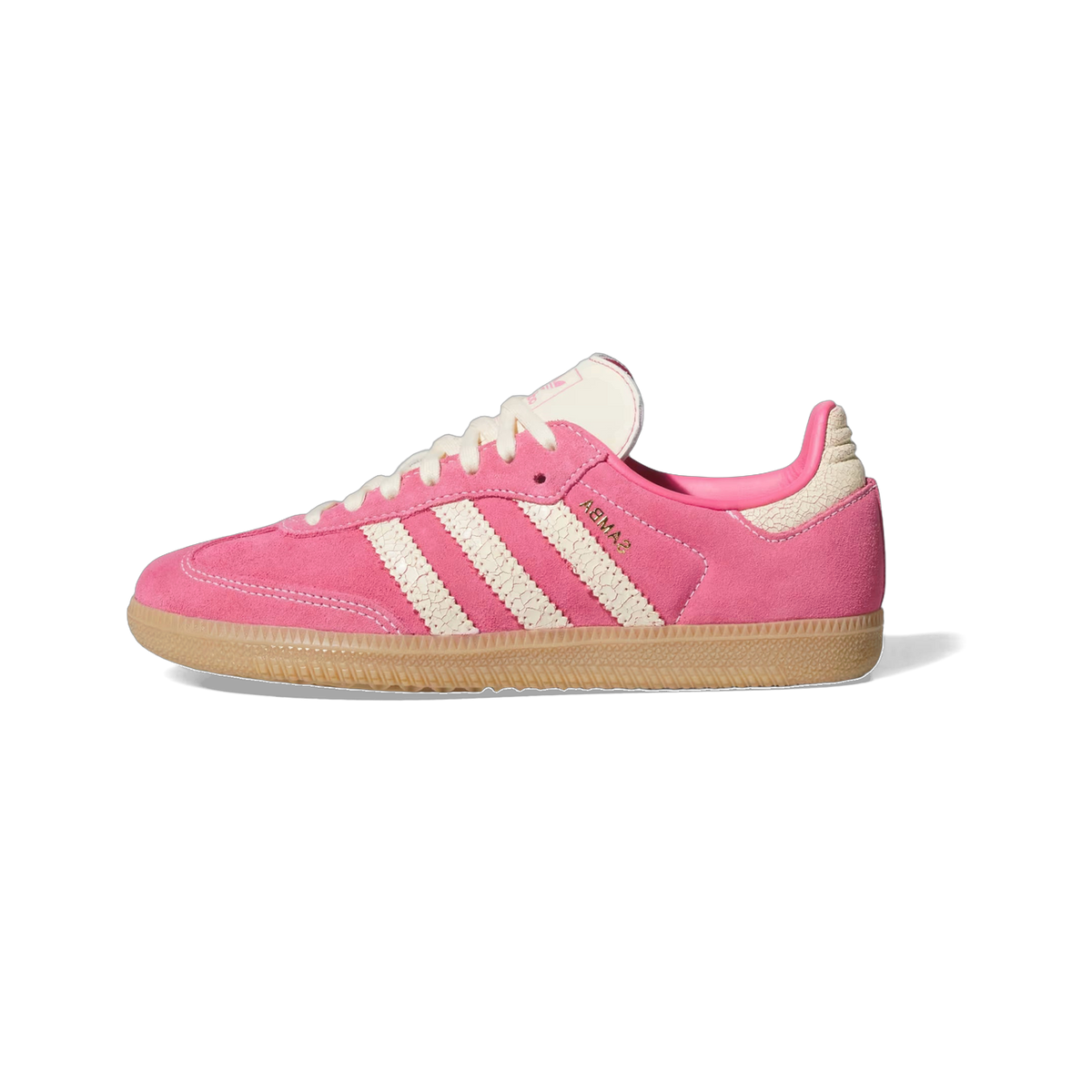 Side view of a pink suede Adidas Samba sneaker with cream cracked-texture stripes, cream laces, and a gum rubber sole.