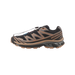 Right side view of a black Salomon XT-6 trail sneaker with brown overlays, tan midsole, speed-lace toggle, and visible SALOMON branding on the lateral panel.